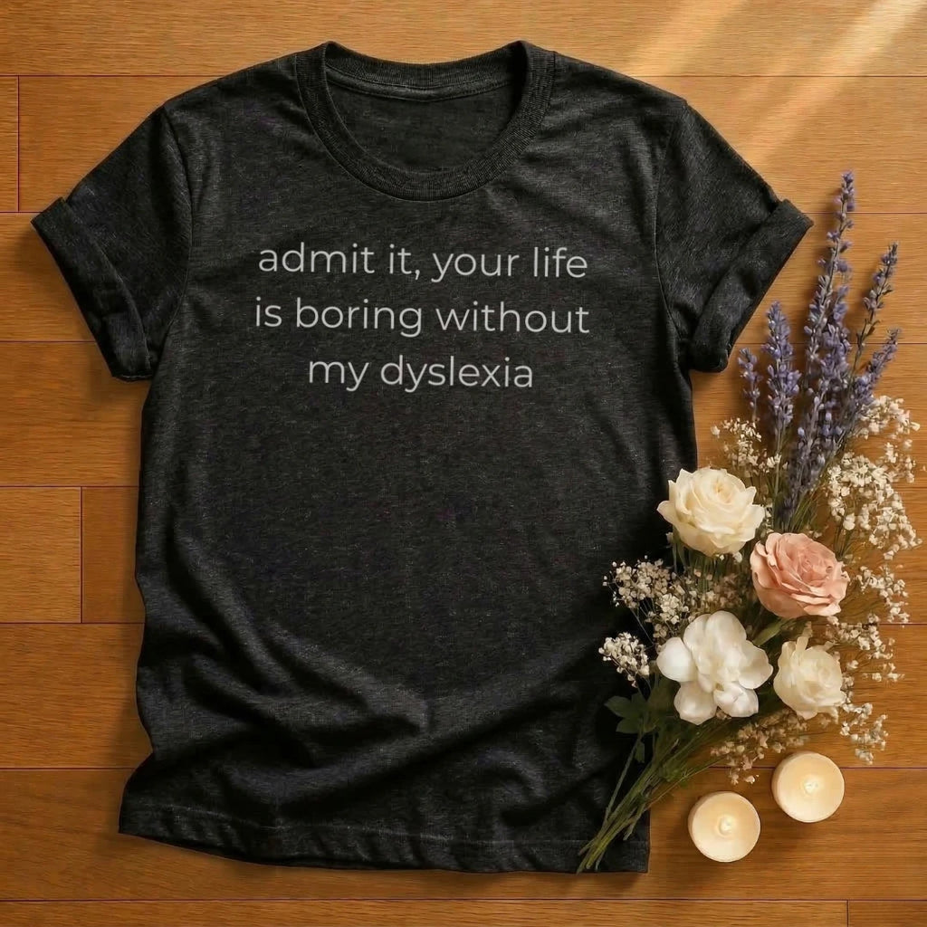 https://wescale-cdn.com/generated-mockups/666ffdf4-3d69-46d2-92d6-f61d0e656fc2/b4d99c63-6a18-4b0c-a619-bae513c795c1/ca09d525-eaa6-4789-85bb-9316ec0543c5_designs/admit_it_life_is_boring_dyslexia_white_1774627828129_17hc6k.png_1774627829177.webp