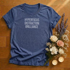 https://wescale-cdn.com/generated-mockups/666ffdf4-3d69-46d2-92d6-f61d0e656fc2/efb9f0bb-e9eb-404b-ba51-710a74d9663e/e144645b-b7d3-44e9-8c72-7c5860084014_designs/hyperfocus_distraction_brilliance_white_1774633732273_8rcte4.png_1774633733839.webp
