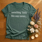 https://wescale-cdn.com/generated-mockups/666ffdf4-3d69-46d2-92d6-f61d0e656fc2/a704c257-bf38-4bfa-b8c6-19ae13e19670/15d2b2ae-2553-4aa7-aeaf-7a3c6d328e3b_designs/something_tistic_this_way_comes_white_1775153717942_lauvok.png_1775153719346.webp